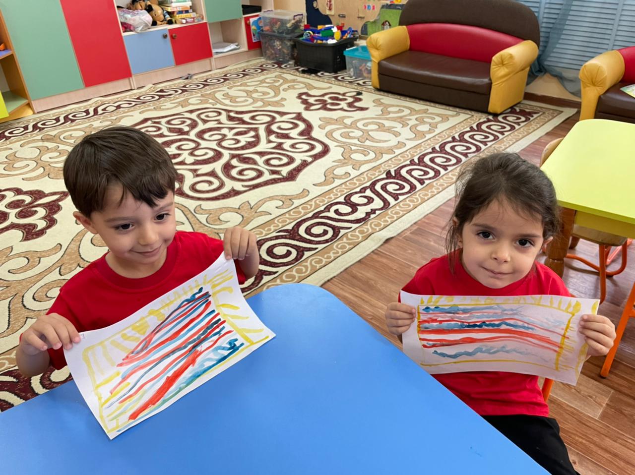 ОУД " Рисование" тема " Коврик для котенка" цель: дети смогут по показу нарисовать коврик для котенка. старшая группа " Балапан"